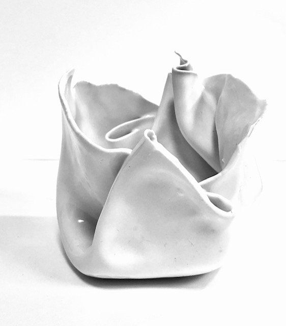 A white object is sitting on a white surface