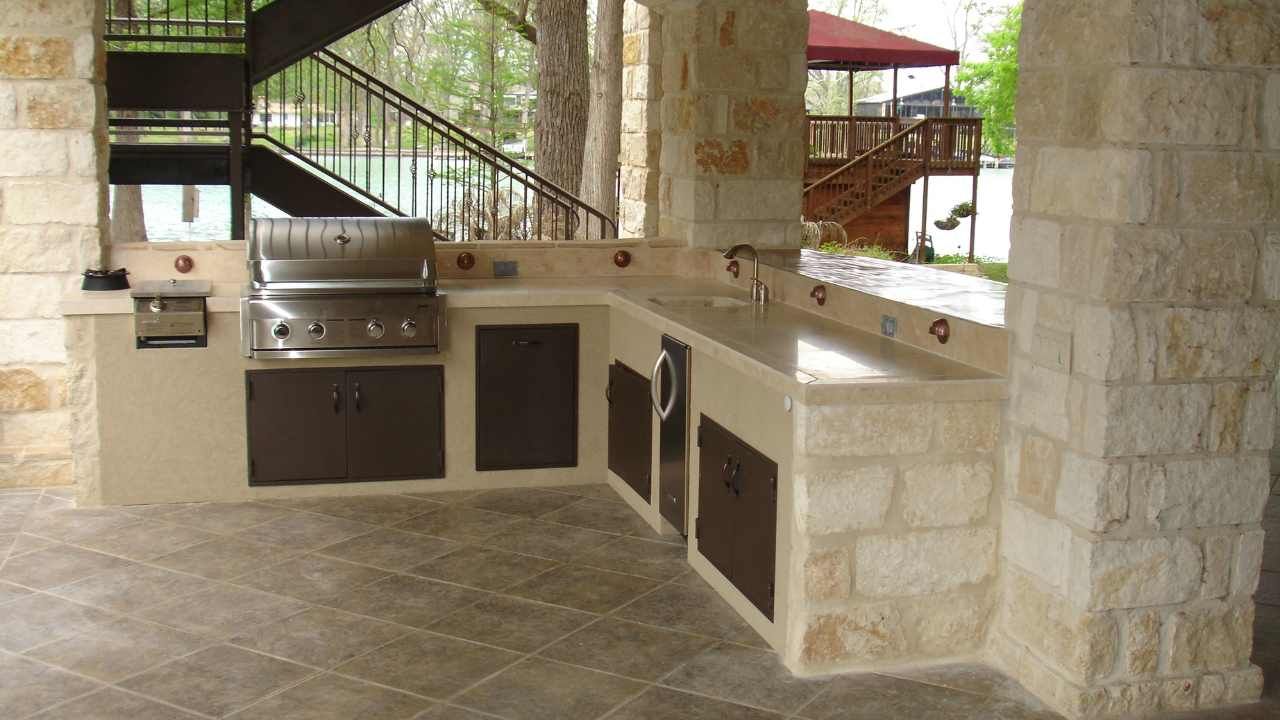 “Partially built concrete block wall inside a structure showing careful block and retaining wall layout”