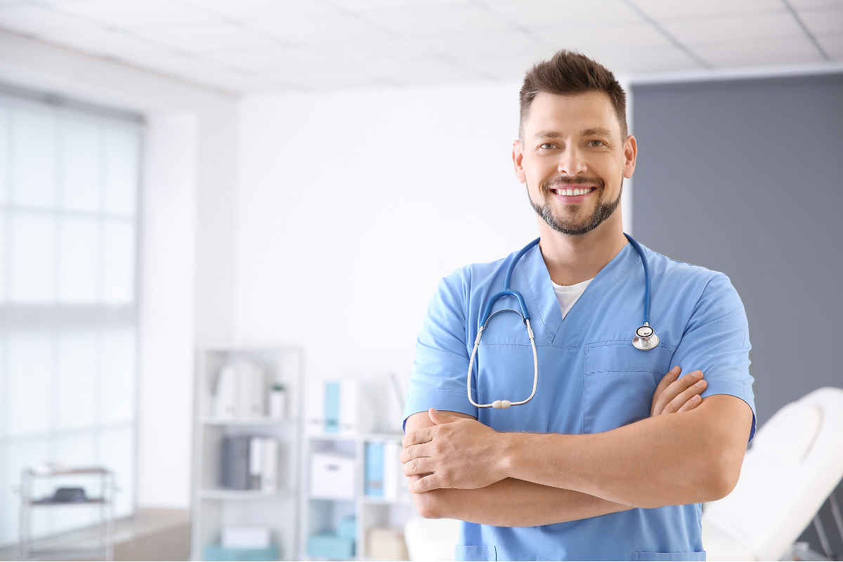 Nurse practitioner standing smiling