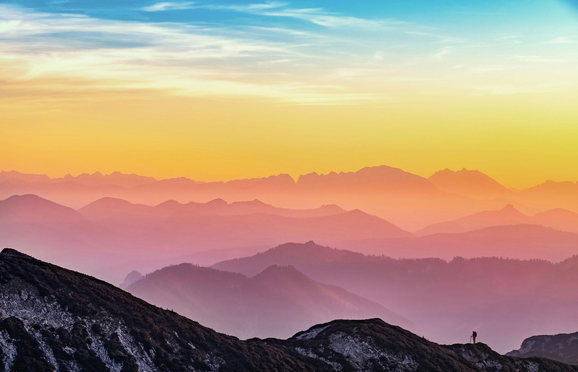 a sunset sky landscape over the mountains