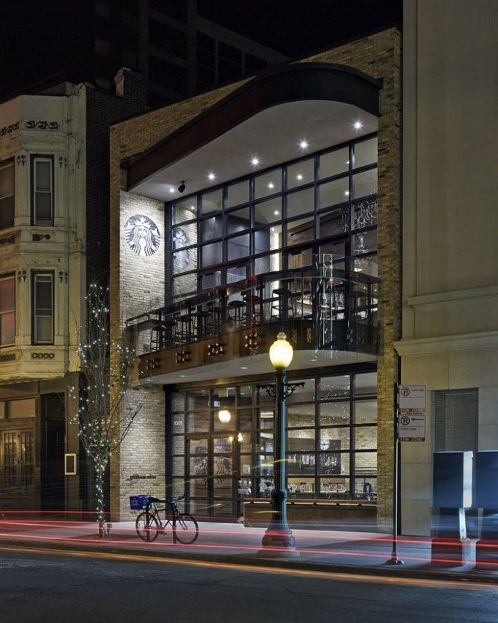 A large building with a starbucks logo on it