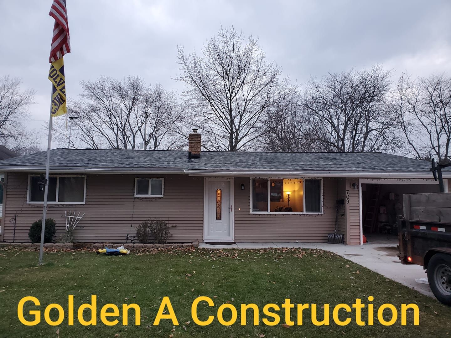 A picture of a house under construction by golden a construction