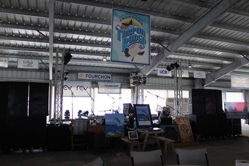 A room with tables and chairs and a sign that says triumph thunder