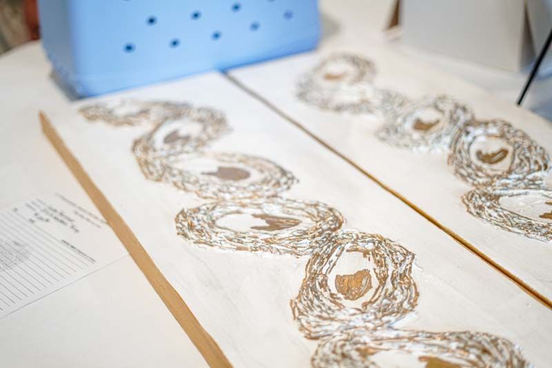 A piece of paper with a pattern on it is sitting on a table.