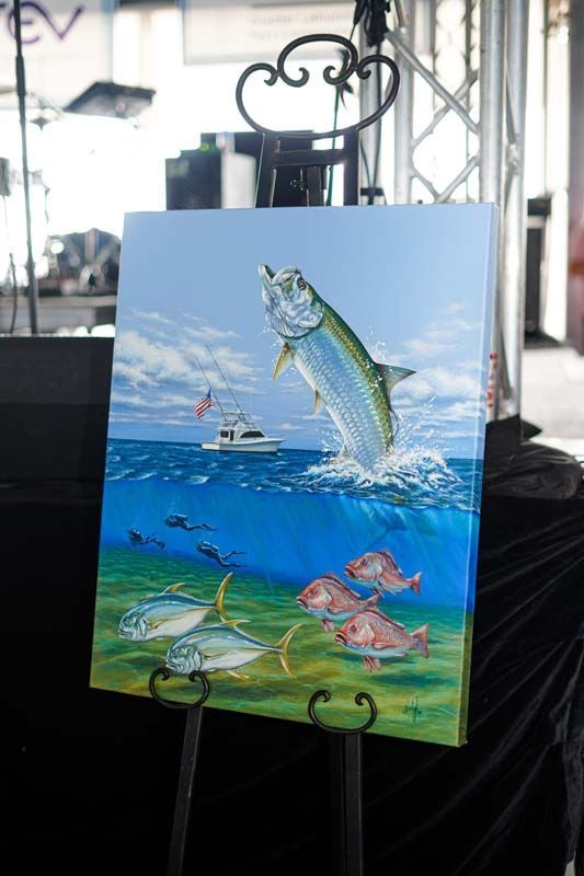 A painting of a fish jumping out of the water