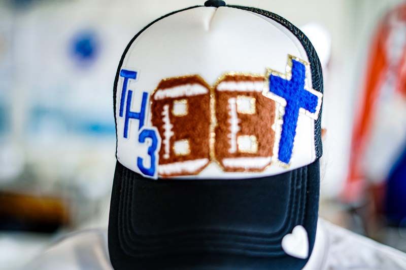 A baseball cap with the number 3 on it