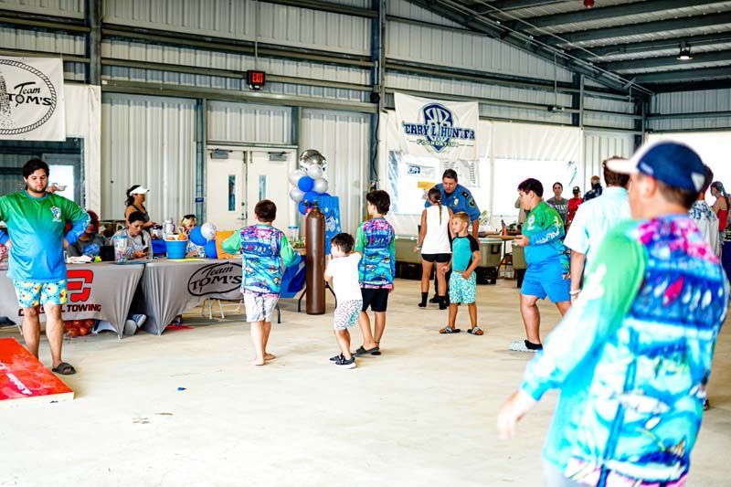 A group of people are standing in a room playing a game.