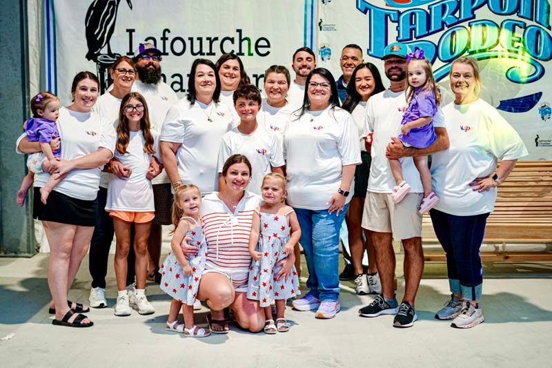 A large group of people are posing for a picture.