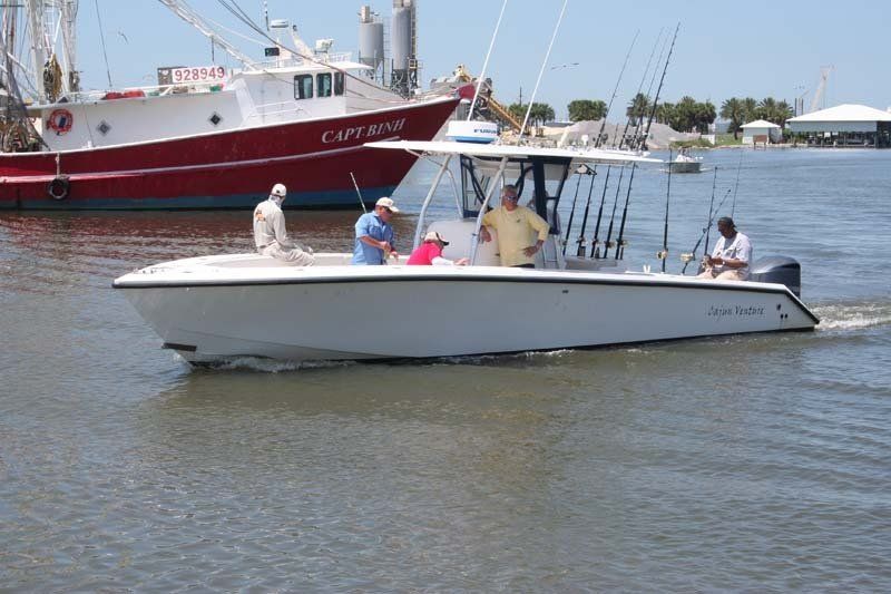A boat that has the word captain on it