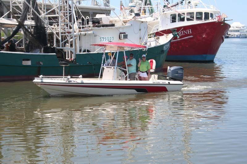 A boat with the number 71117 on the side of it