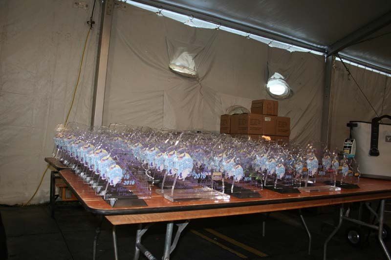 A table with a lot of trophies on it