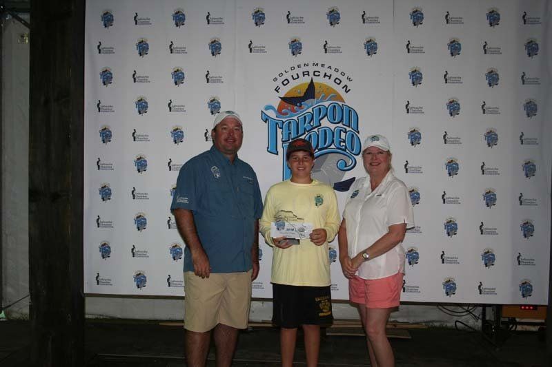 A group of people standing in front of a banner that says tampa bay