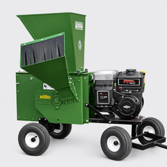 Green gas-powered wood chipper on wheels with black engine and chute.