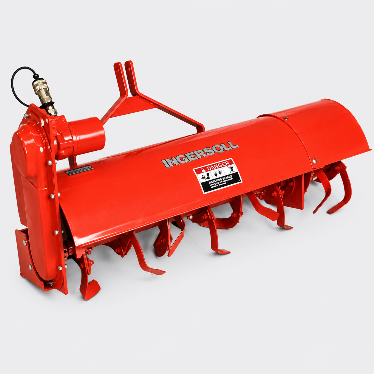 Red Ingersoll rotary tiller with metal tines on a white background