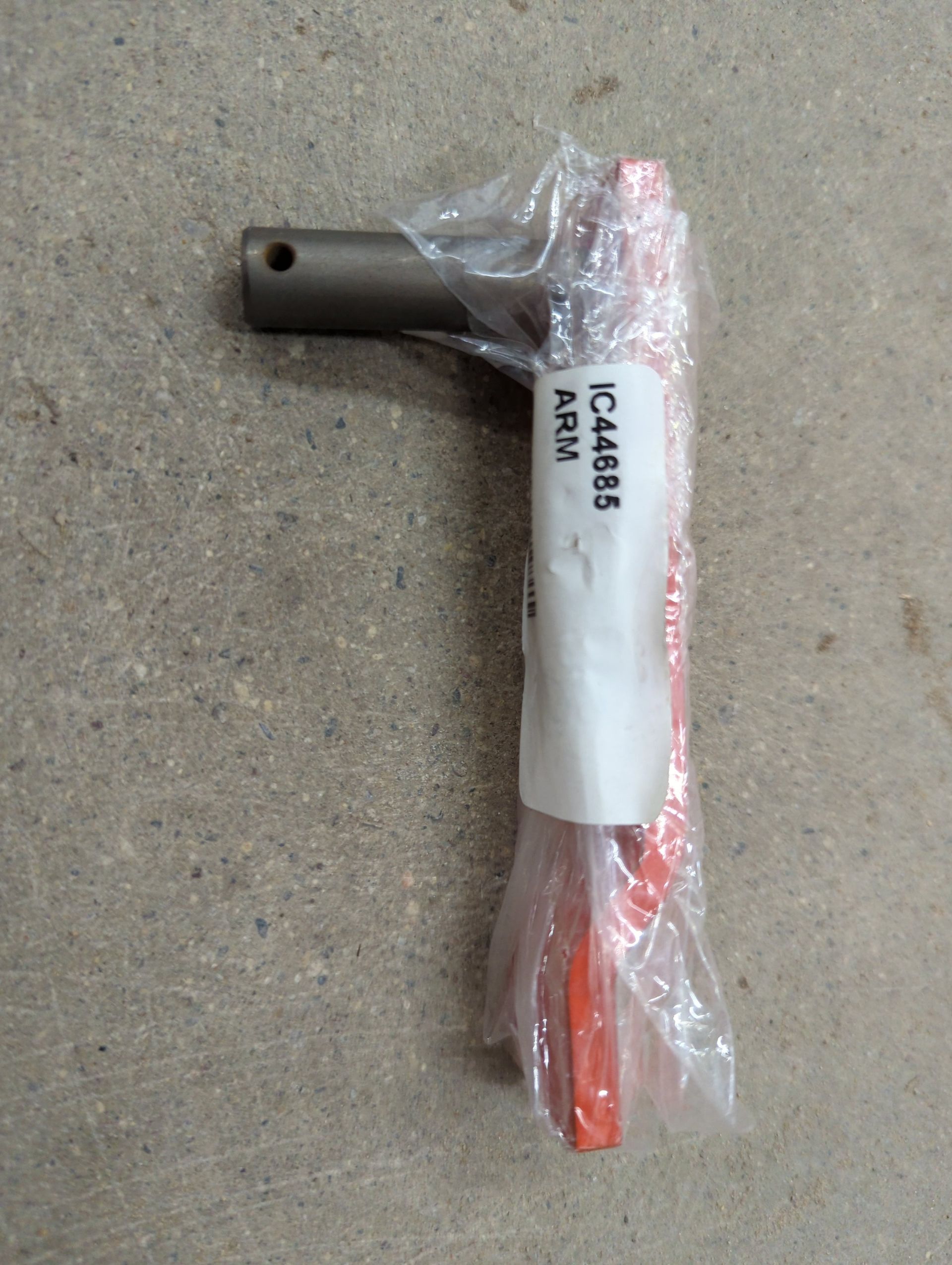 Packaged red-handled tool with black metal head on a gray surface, labeled “KACA 886.”