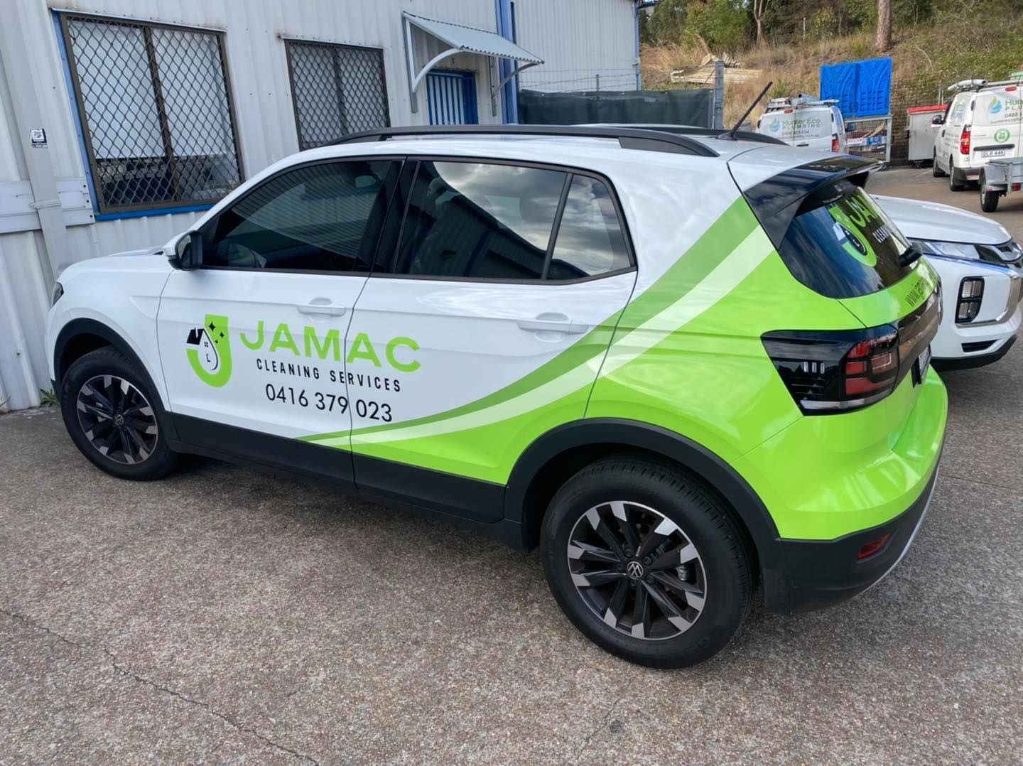 Bathroom With Shower, Bathtub, Toilet, and Window — Jamac Cleaning Services in Cardiff, NSW