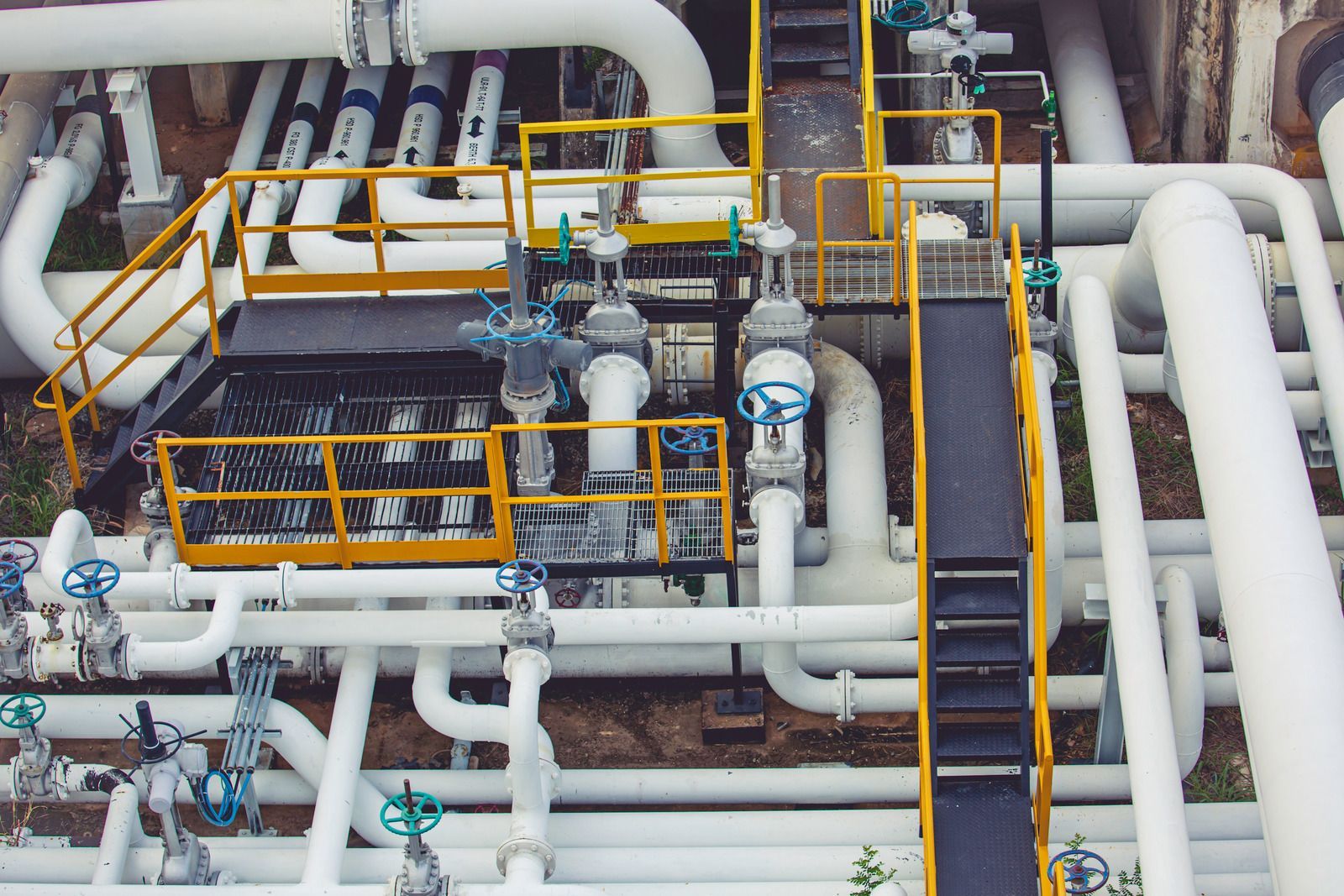 A bunch of pipes are connected to each other in a factory.