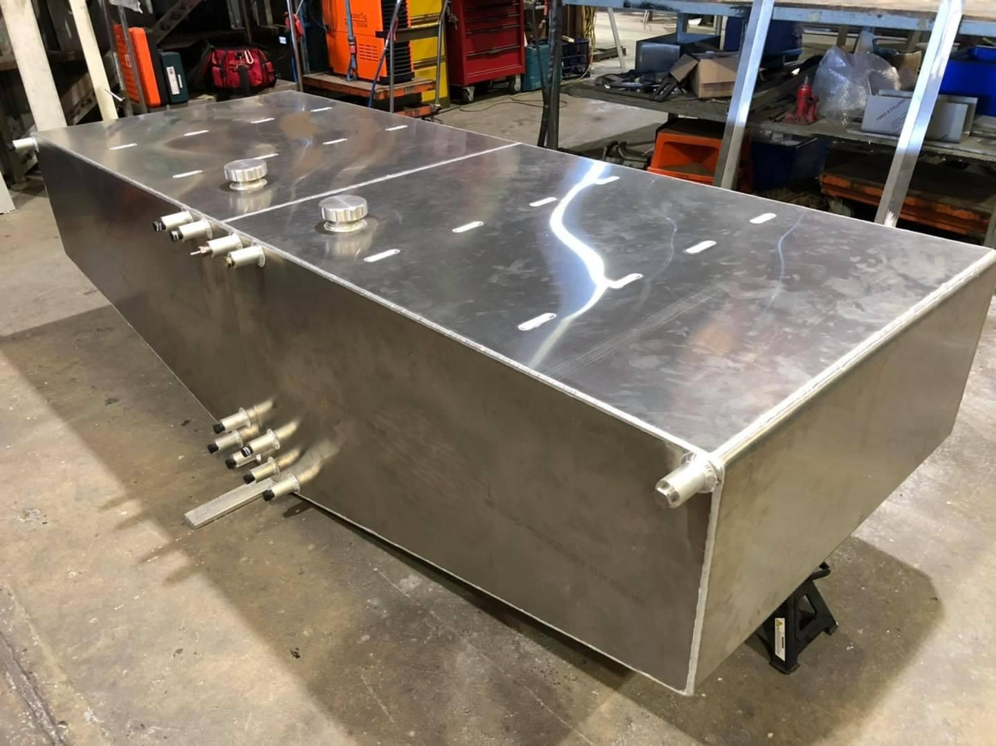 A Large Aluminium Tank Is Sitting on Top of A Table — Shearwater Engineering in Forster, NSW