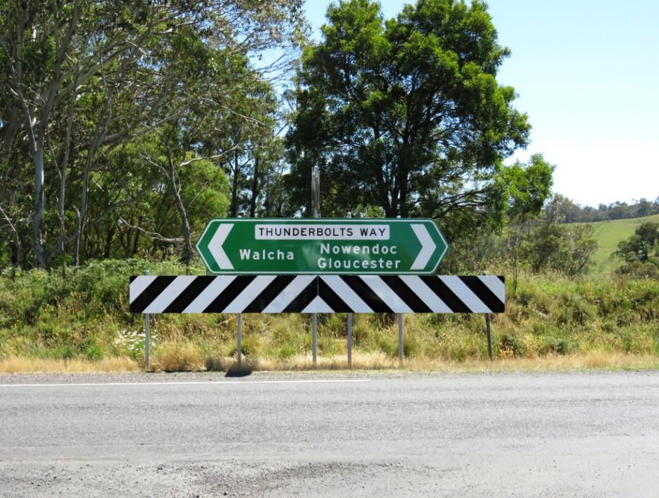 A Sign on The Side of A Road that Says Thunderbolts Way — Shearwater Engineering in Gloucester, NSW