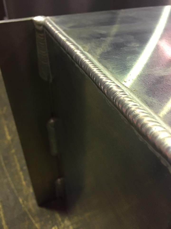 A Close up Of a Piece of Metal with A Welding Joint — Shearwater Engineering in Taree, NSW