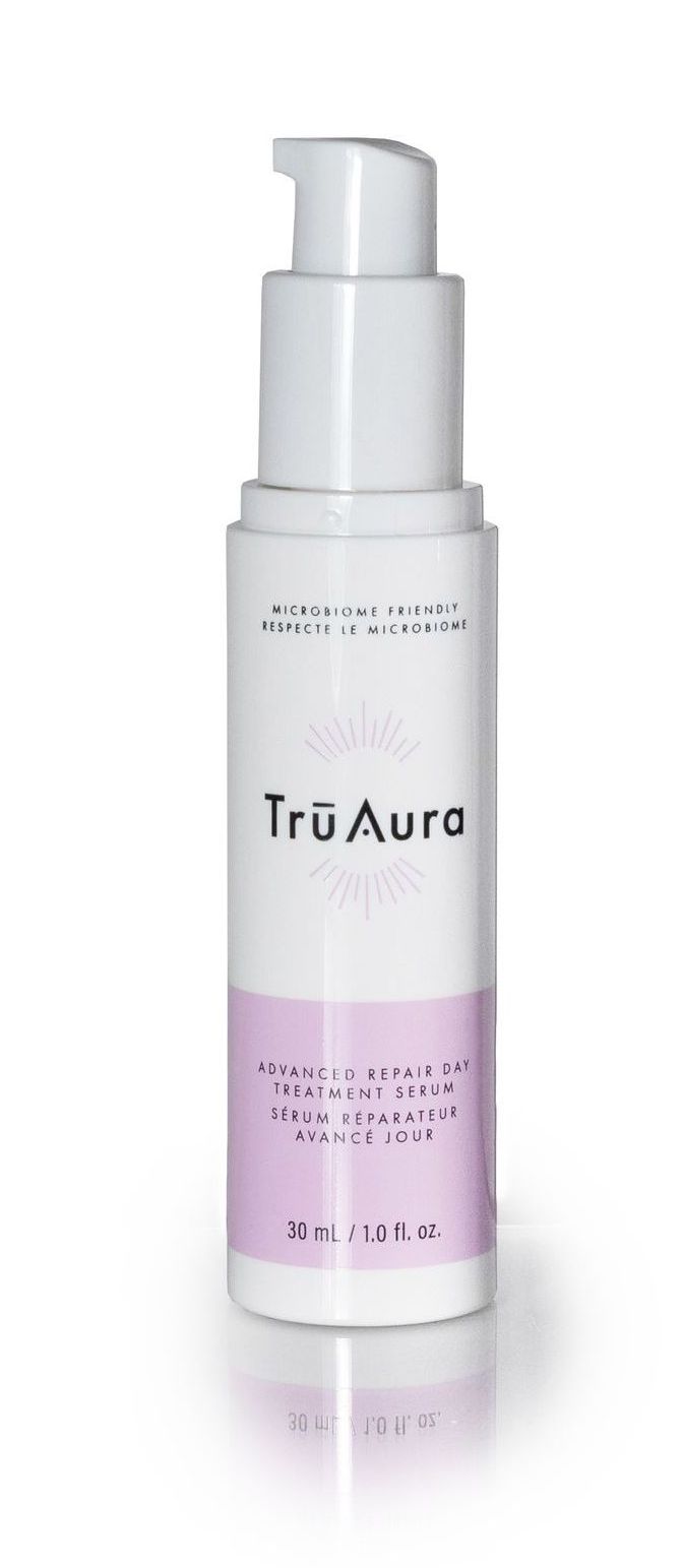 A white bottle labled TruAura Advanced Repair Night Treatment Serum