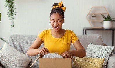 woman opening gift