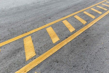 Asphalt Road with Yellow Line — Parking Construction in Loas Angeles, CA