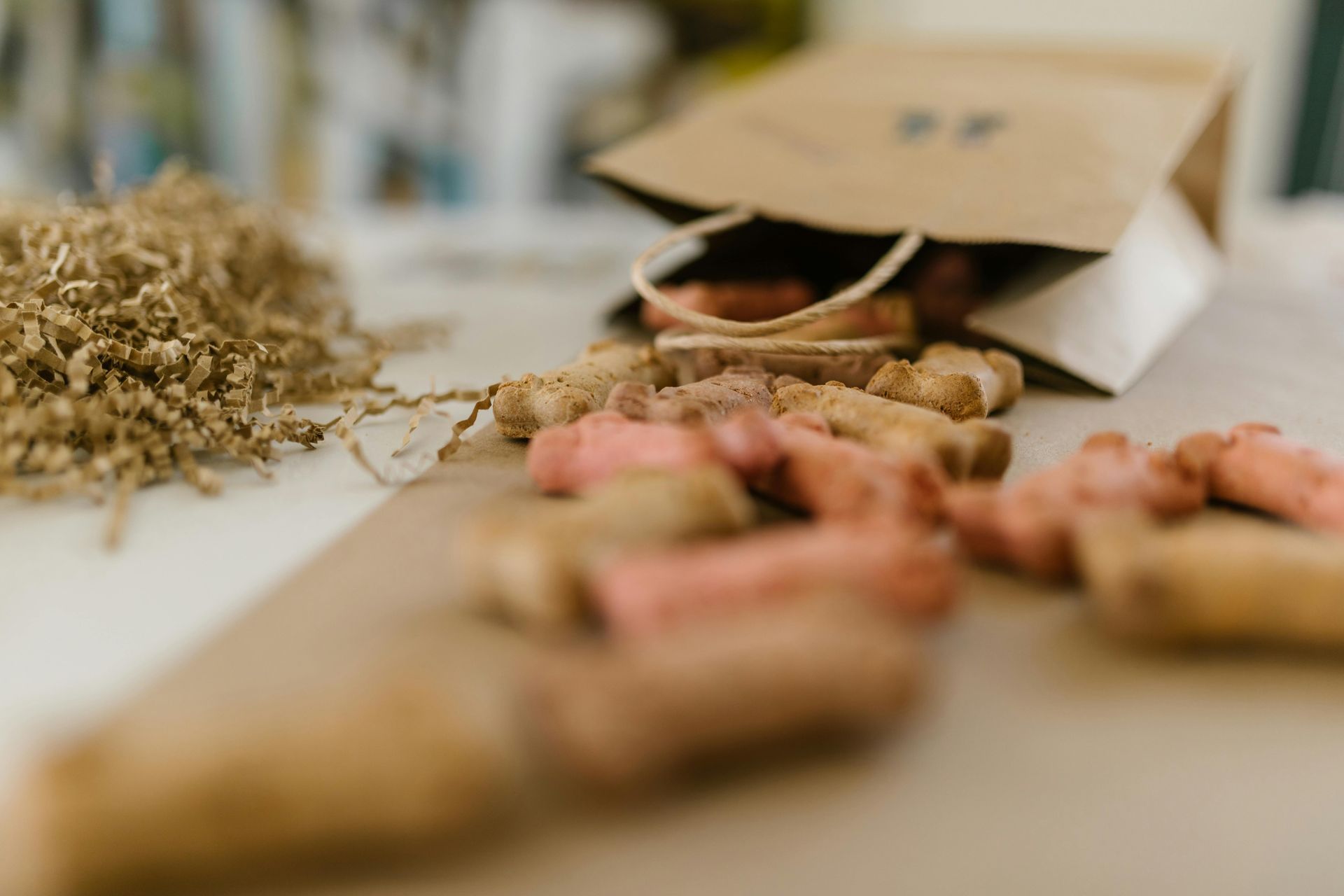 A bag filled with wine corks is sitting on a table.