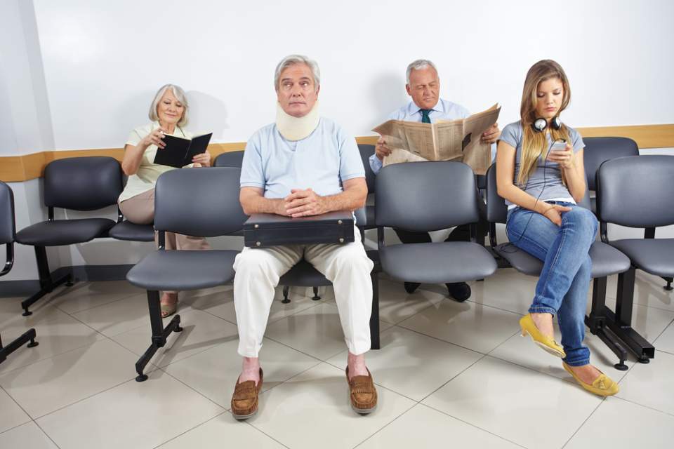 People sitting on upholstered chair