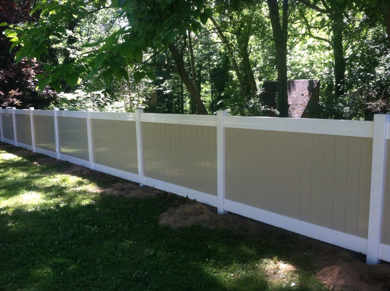 Side View Of Brown And White Vinyl Fence — Hatboro, PA — Main Street Fence