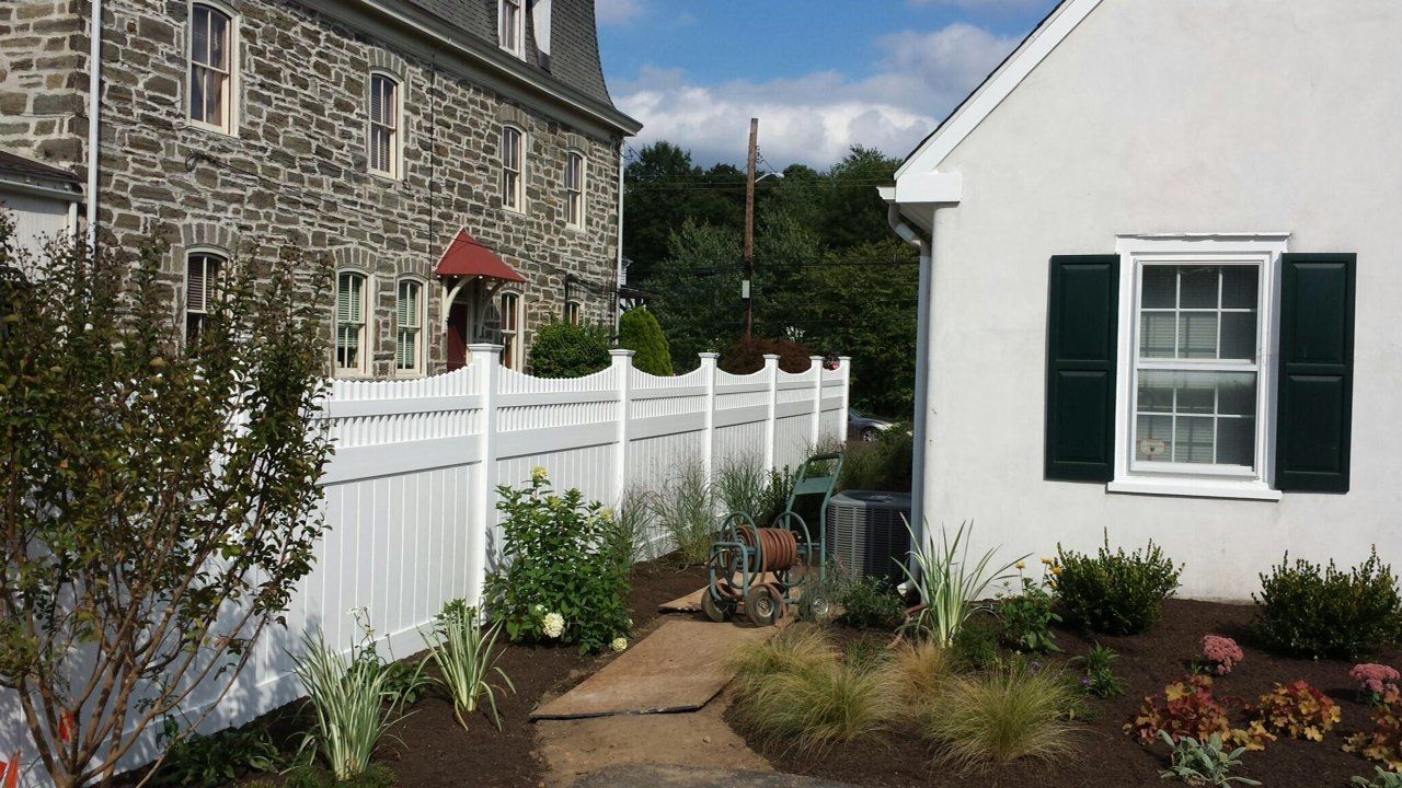 Side View Of Vinyl Fence Beside A House — Hatboro, PA — Main Street Fence