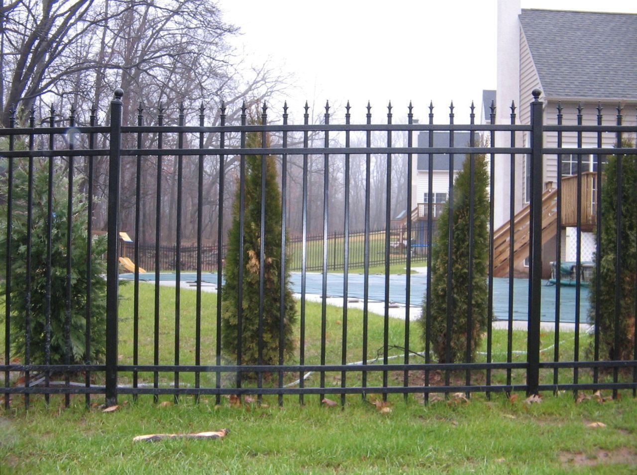 Black Aluminum Fence With Plants — Hatboro, PA — Main Street Fence