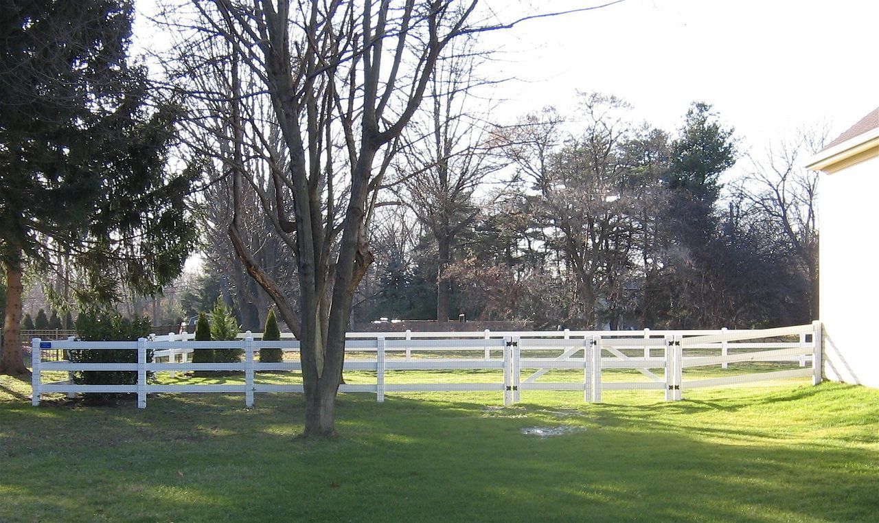 Vinyl Fence In A Yard — Hatboro, PA — Main Street Fence