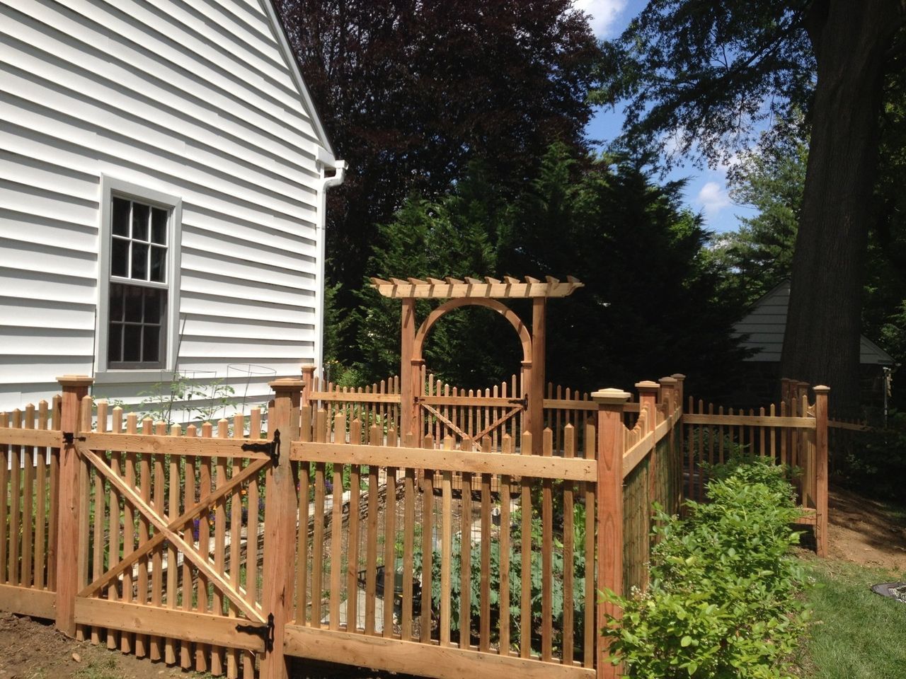 View Of Brown Two By Two Picket Fence Beside House — Hatboro, PA — Main Street Fence