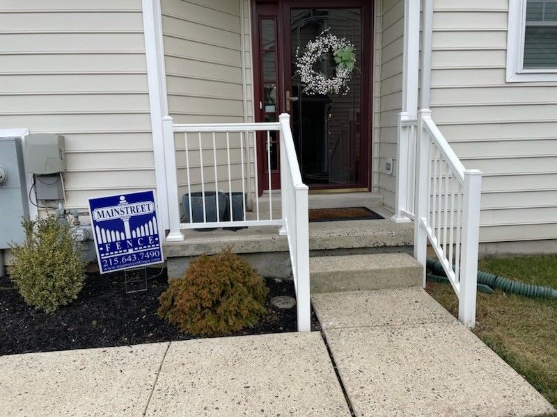 A house with a wanted sign on the porch
