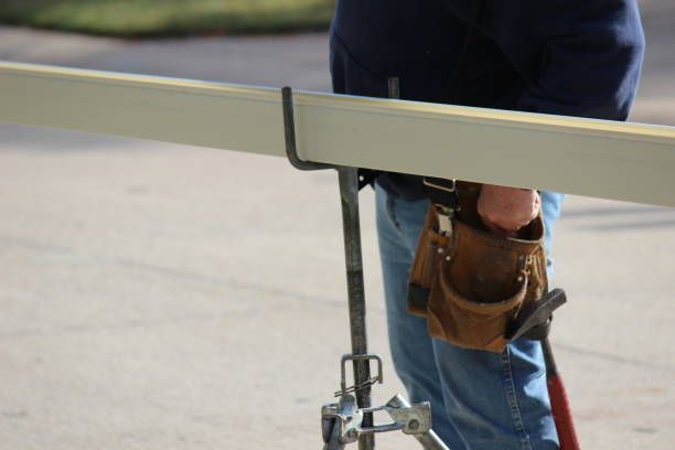 A person holding a tool belt