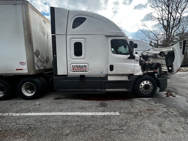 A person is holding a hose with a handle on it.