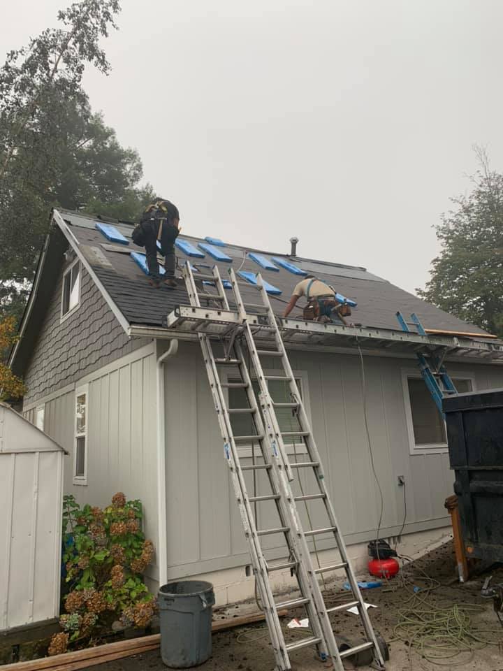 Progress on roof installation, asphalt shingles roof. Charlie Roofing, Olympia Roofer.