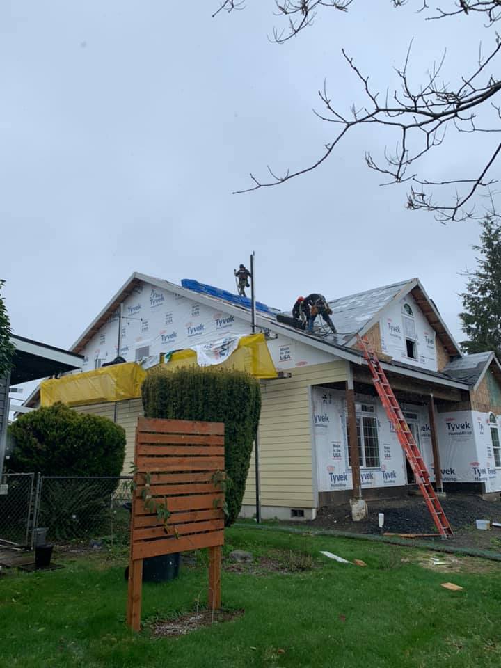 Progress on roof installation, asphalt shingles roof. Charlie Roofing, Olympia Roofer.