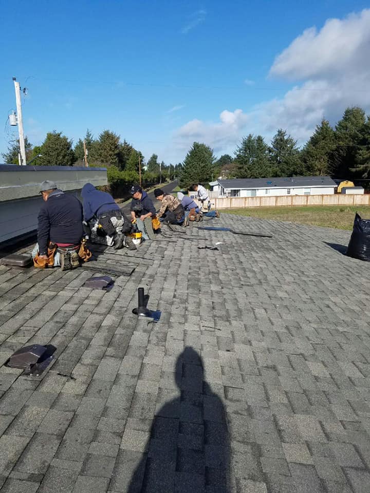 Progress on roof installation, asphalt shingles roof. Charlie Roofing, Olympia Roofer.