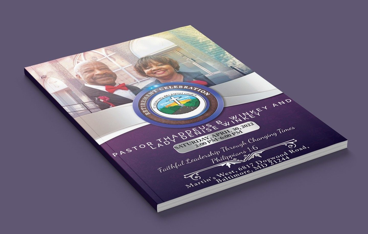 A purple book with a picture of a man and woman on the cover.