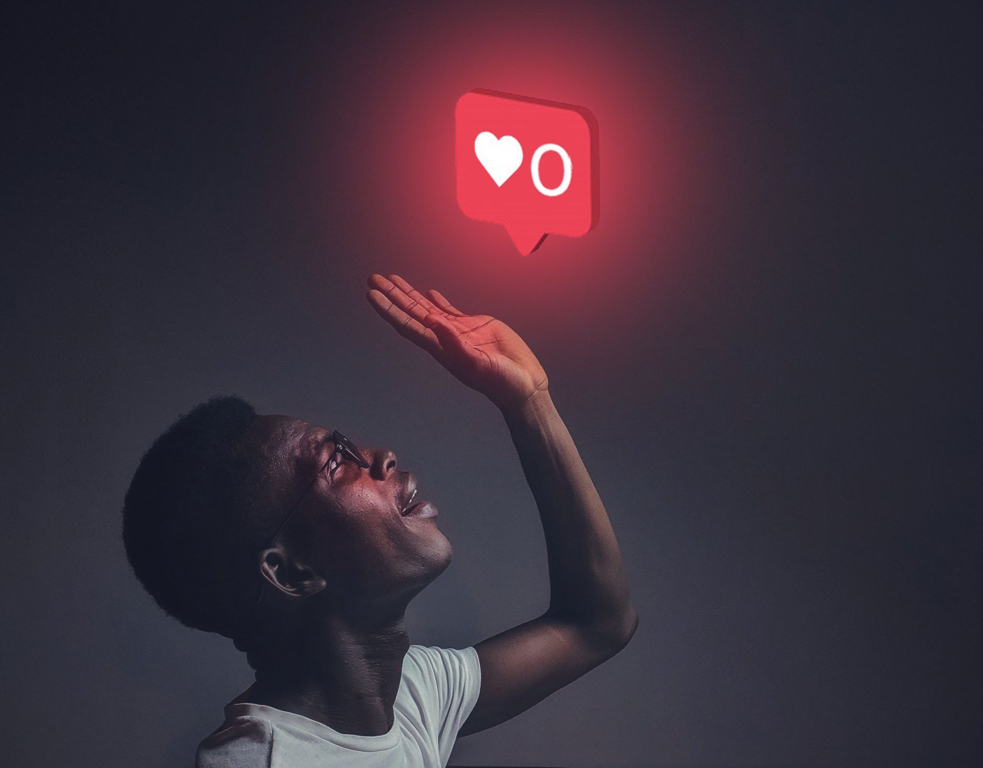 Image of a man reaching for a like icon