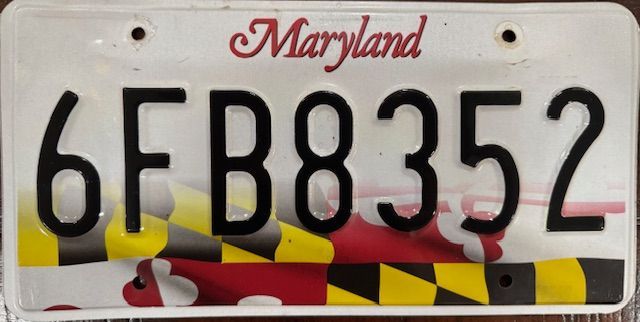 Maryland license plate with the alphanumeric sequence 6FB8352.