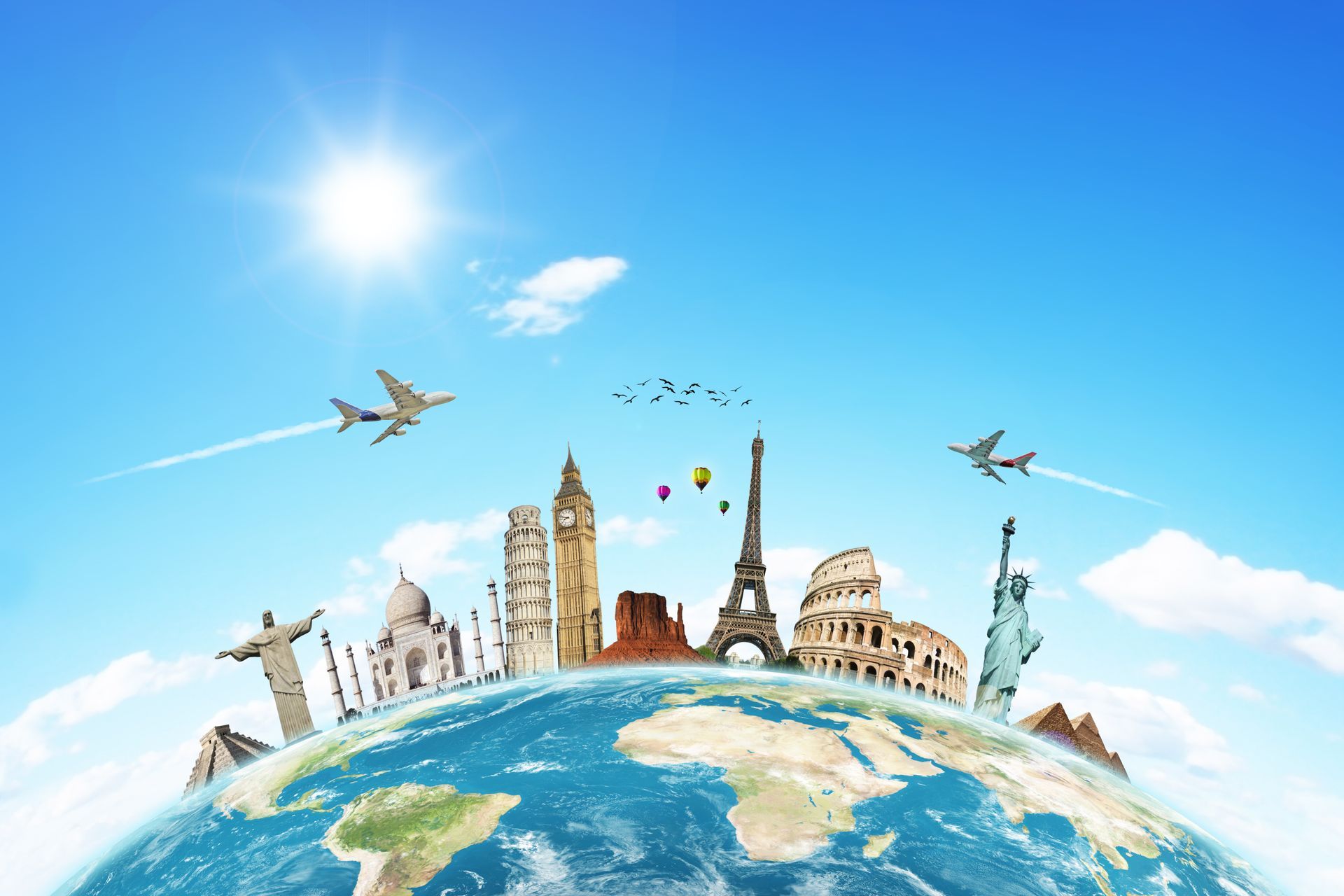 World landmarks rising from a tiny globe under a bright blue sky, with airplanes flying overhead