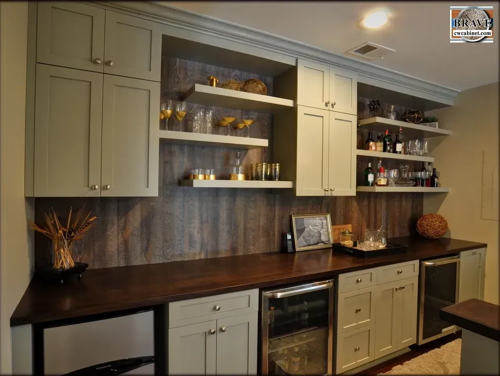 A kitchen with lots of cabinets and shelves