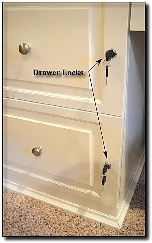 A picture of a drawer with drawer locks on it