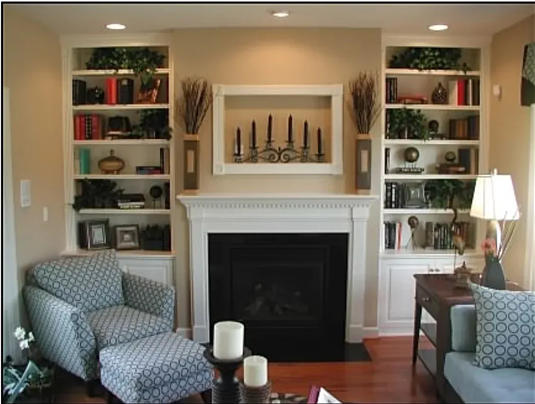 A living room with a fireplace and a chair