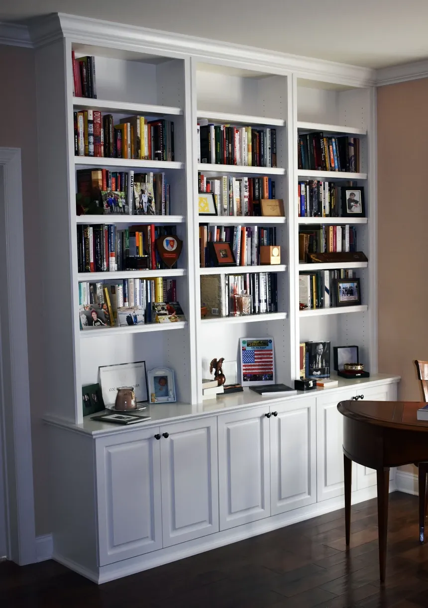 A bookcase with a lot of books on it