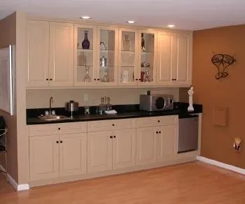 A kitchen with lots of cabinets and a sink