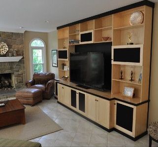 A living room filled with furniture and a flat screen tv